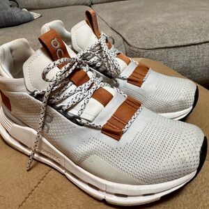 On Running White and Brown Athletic Shoes